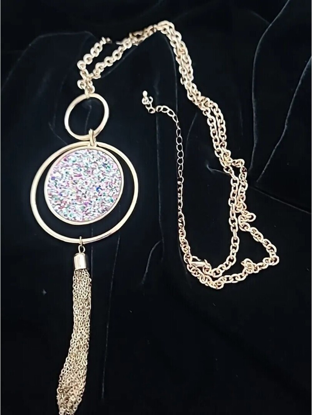 Sparkly Circle Pendant Necklace With Gold Tone Chain with a Tassel